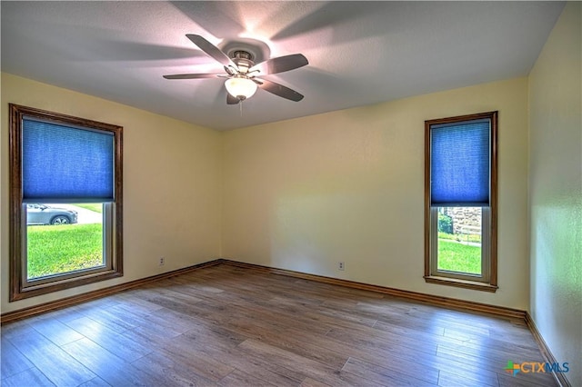 2702 Olympia Dr, Temple, TX 76502 - spare room featuring wood finished floors and ceiling fan