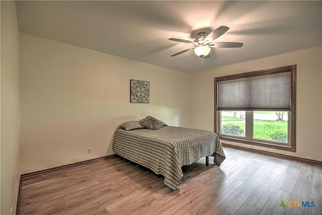 2702 Olympia Dr, Temple, TX 76502 - bedroom with wood finished floors and ceiling fan