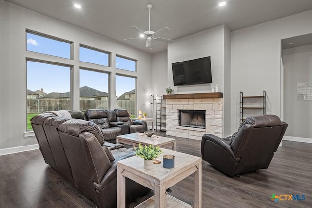 2716 Prairie Chapel Ct, Temple, TX 76502 - living room with a ceiling fan, dark wood-style floors, baseboards, recessed lighting, and a fireplace