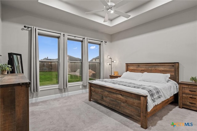 2716 Prairie Chapel Ct, Temple, TX 76502 - bedroom featuring carpet floors, a tray ceiling, baseboards, and a ceiling fan