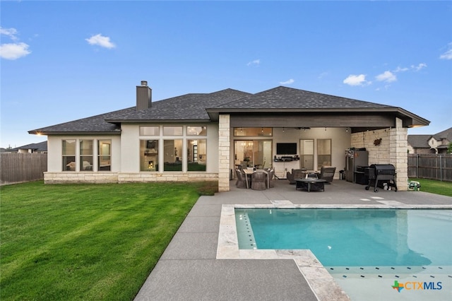 2716 Prairie Chapel Ct, Temple, TX 76502 - rear view of property with a patio, stone siding, roof with shingles, and a chimney