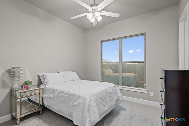 2716 Prairie Chapel Ct, Temple, TX 76502 - bedroom featuring baseboards, light colored carpet, and a ceiling fan