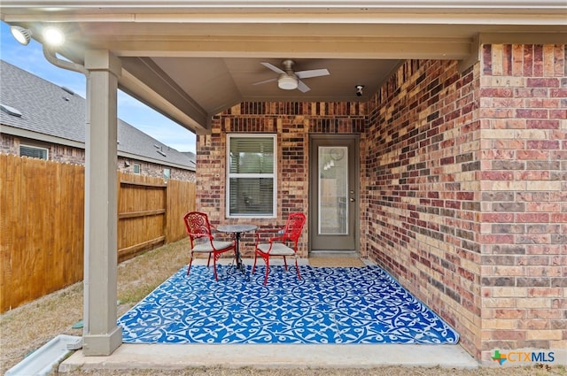 view of patio / terrace featuring ceiling fan