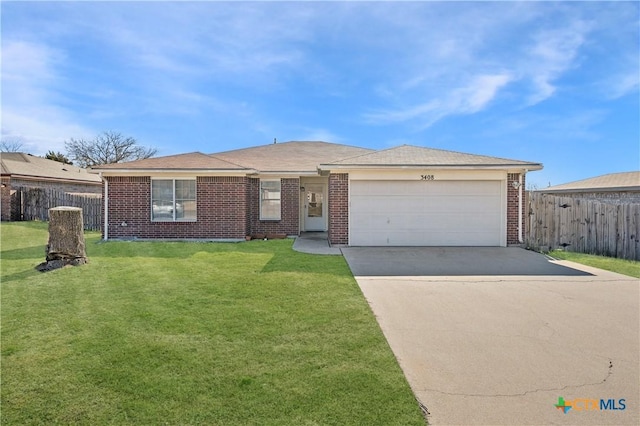 ranch-style home featuring a garage and a front lawn