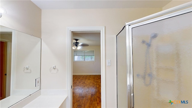 107 Hampton Ct, Victoria, TX 77904 - bathroom with ceiling fan, wood finished floors, an enclosed shower, and vanity
