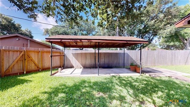107 Hampton Ct, Victoria, TX 77904 - fenced backyard with a gazebo and a patio area