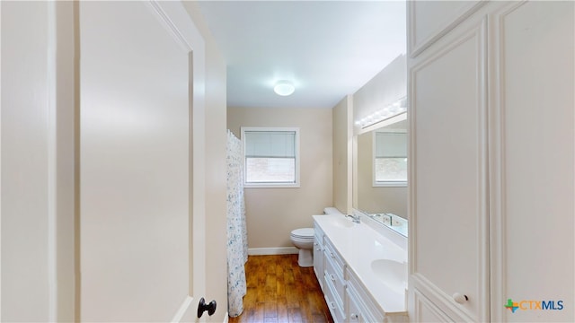 107 Hampton Ct, Victoria, TX 77904 - bathroom with double vanity and wood finished floors