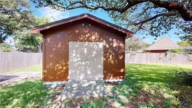 107 Hampton Ct, Victoria, TX 77904 - view of shed with a fenced backyard
