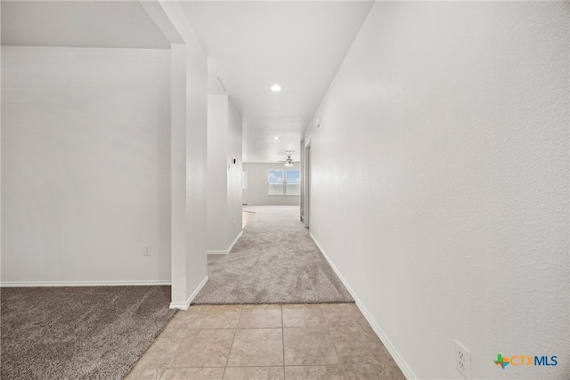 306 W Gemini Ln, Killeen, TX 76542 - hallway with light colored carpet, recessed lighting, and light tile patterned flooring