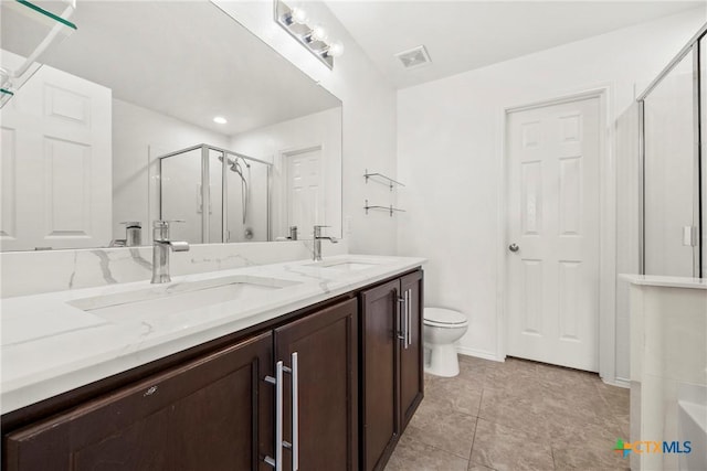 306 W Gemini Ln, Killeen, TX 76542 - full bathroom with a stall shower and double vanity