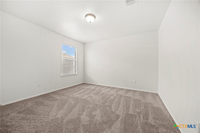 306 W Gemini Ln, Killeen, TX 76542 - spare room with light colored carpet and baseboards