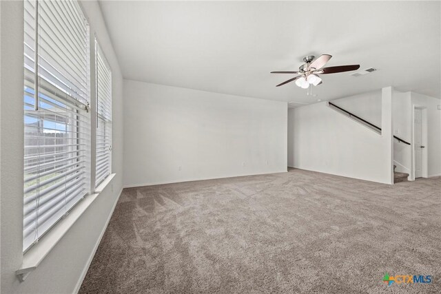 306 W Gemini Ln, Killeen, TX 76542 - carpeted spare room featuring a ceiling fan and baseboards