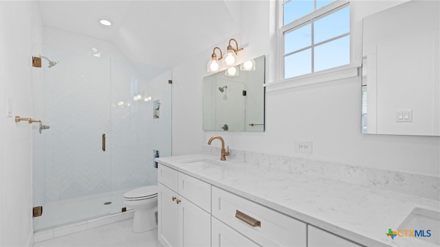 bathroom with tile patterned flooring, vanity, toilet, and an enclosed shower