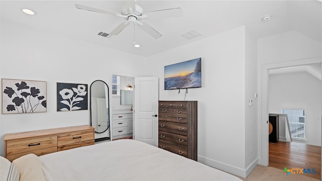 bedroom with hardwood / wood-style floors and ceiling fan