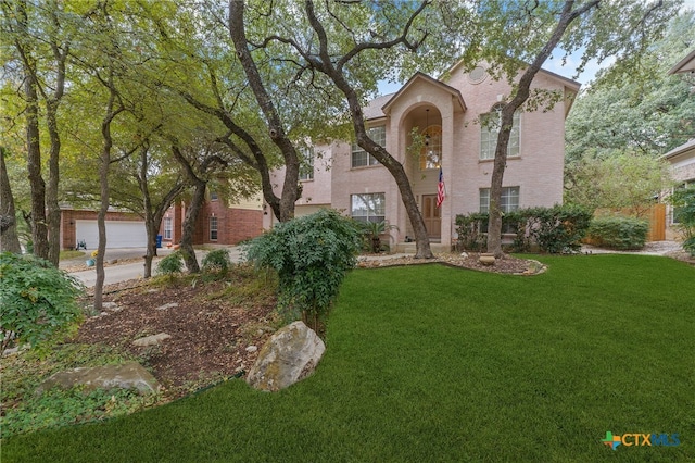 view of front of property with a front lawn