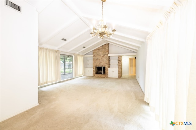 unfurnished living room featuring light carpet, lofted ceiling with beams, a notable chandelier, and a brick fireplace