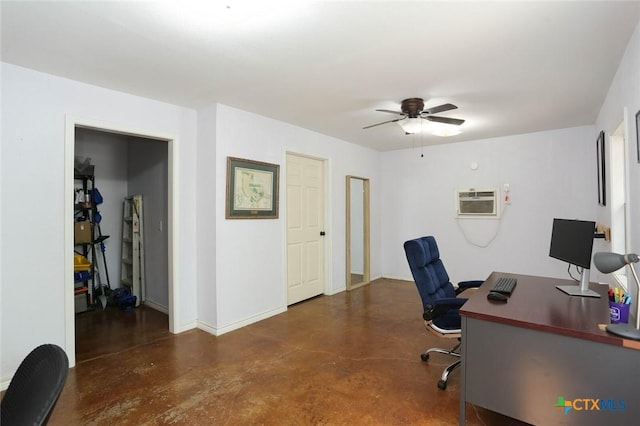 office space featuring a wall mounted AC and ceiling fan