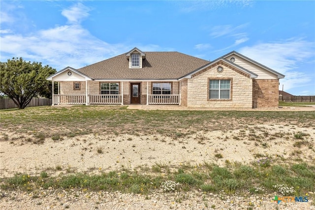 820 Thomas St, Copperas Cove, TX 76522 - view of front of house with brick siding, covered porch, and a shingled roof