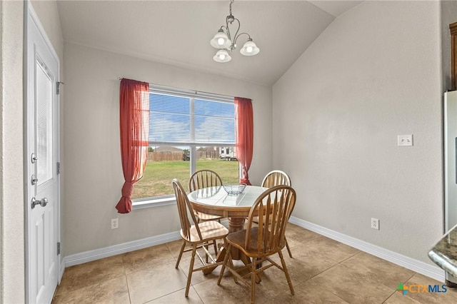 820 Thomas St, Copperas Cove, TX 76522 - dining room with lofted ceiling, a chandelier, baseboards, and light tile patterned floors