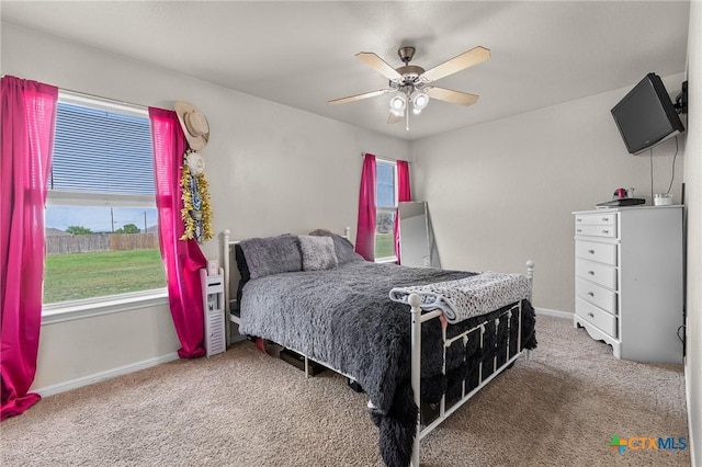820 Thomas St, Copperas Cove, TX 76522 - carpeted bedroom with baseboards and ceiling fan