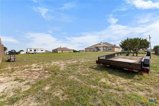 820 Thomas St, Copperas Cove, TX 76522 - view of green lawn with a wooden deck