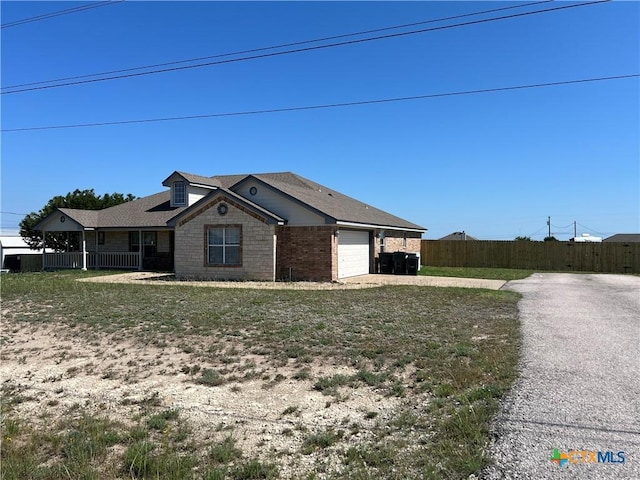 820 Thomas St, Copperas Cove, TX 76522 - view of front of house with an attached garage and driveway