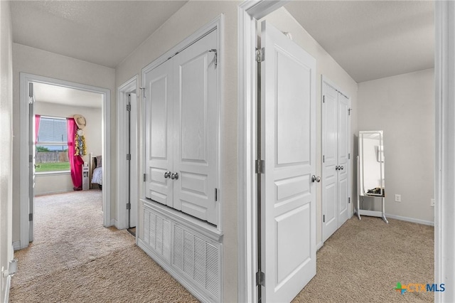 820 Thomas St, Copperas Cove, TX 76522 - hallway with light carpet and baseboards