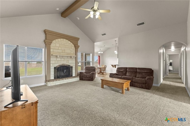 820 Thomas St, Copperas Cove, TX 76522 - living area featuring arched walkways, a ceiling fan, carpet, high vaulted ceiling, and beam ceiling