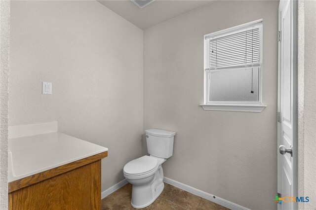 820 Thomas St, Copperas Cove, TX 76522 - half bath with baseboards, toilet, and tile patterned flooring