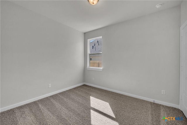 view of carpeted spare room