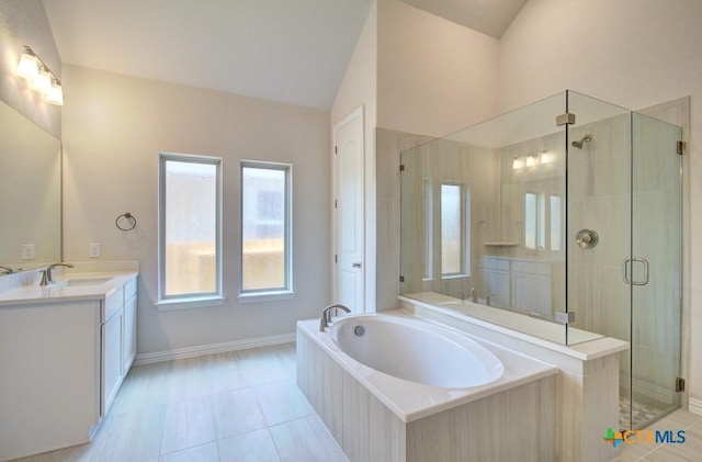 1752 Heritage Maples, New Braunfels, TX 78132 - full bath featuring vanity, tile patterned floors, a garden tub, a shower stall, and baseboards