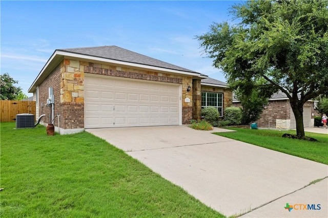 5928 Alexandria Dr, Temple, TX 76502 - ranch-style house featuring stone siding, driveway, and a garage
