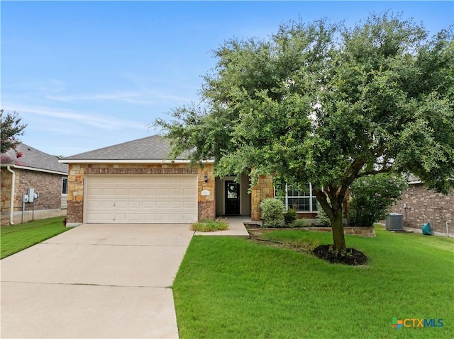 5928 Alexandria Dr, Temple, TX 76502 - view of front of house featuring driveway, a front lawn, a garage, and brick siding