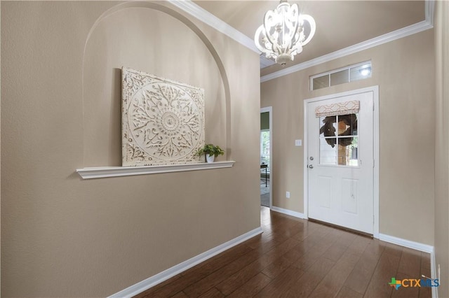 5928 Alexandria Dr, Temple, TX 76502 - foyer entrance with a chandelier, ornamental molding, and wood finished floors