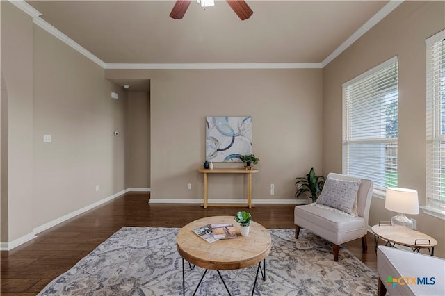 5928 Alexandria Dr, Temple, TX 76502 - living area with wood finished floors, crown molding, and ceiling fan