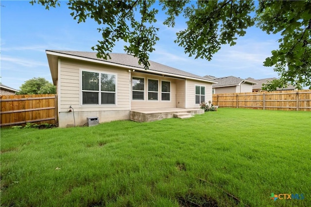 5928 Alexandria Dr, Temple, TX 76502 - rear view of property with a fenced backyard