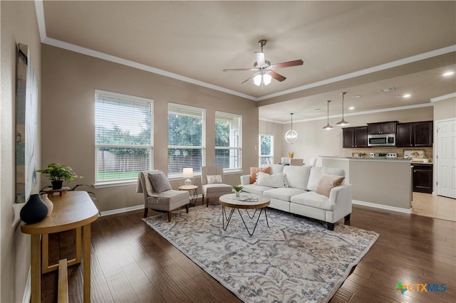 5928 Alexandria Dr, Temple, TX 76502 - living area featuring ceiling fan, plenty of natural light, ornamental molding, wood-type flooring, and recessed lighting