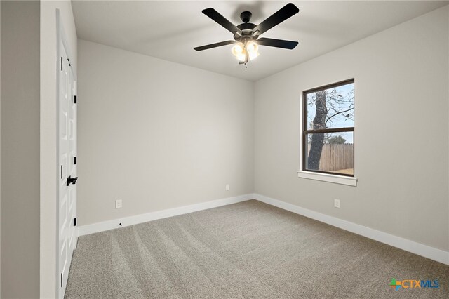 unfurnished room featuring carpet flooring and ceiling fan