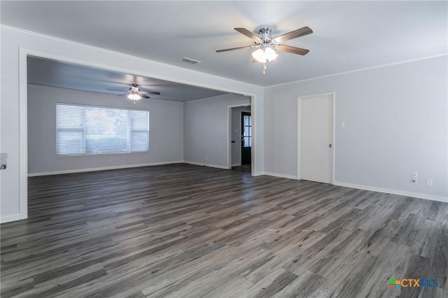 unfurnished room featuring ceiling fan and dark hardwood / wood-style flooring