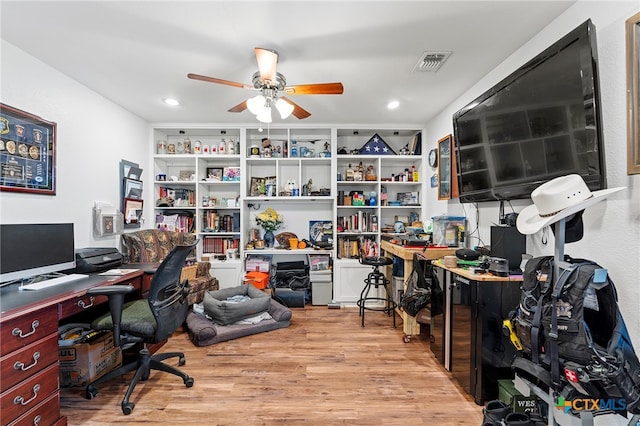 office space featuring light wood-type flooring and ceiling fan