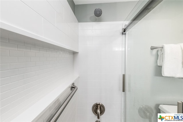 bathroom with an enclosed shower