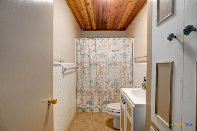 bathroom with tile patterned flooring, curtained shower, wooden ceiling, toilet, and tile walls