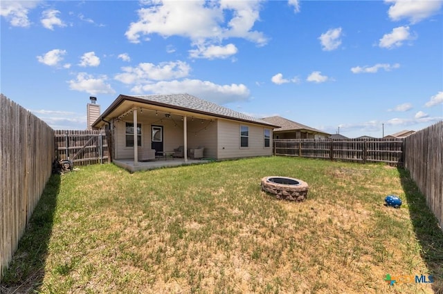 1401 Juneberry Park Dr, Temple, TX 76502 - rear view of property featuring a fire pit and a patio