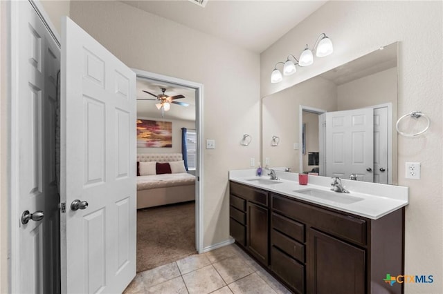 1401 Juneberry Park Dr, Temple, TX 76502 - bathroom with ensuite bath, double vanity, ceiling fan, and tile patterned flooring