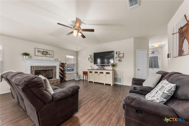 1401 Juneberry Park Dr, Temple, TX 76502 - living area featuring ceiling fan, dark wood-style flooring, a fireplace, and baseboards