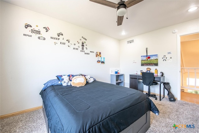 carpeted bedroom featuring ceiling fan