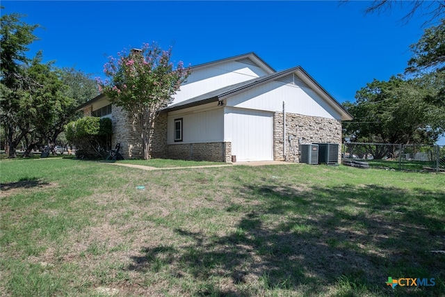 view of property exterior with a yard