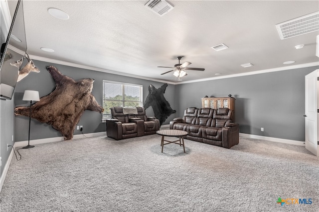 carpeted living room with a textured ceiling, ornamental molding, and ceiling fan