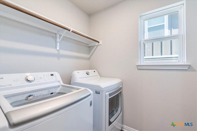 laundry room featuring laundry area and washer and dryer