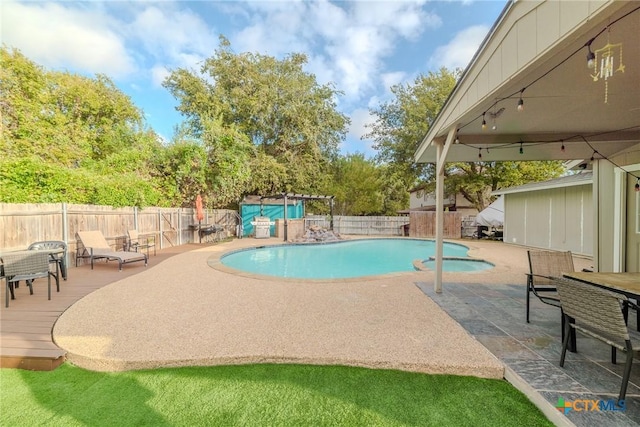 2703 Schulze Dr, Killeen, TX 76549 - view of swimming pool featuring a fenced backyard, a patio area, and a pool with connected hot tub